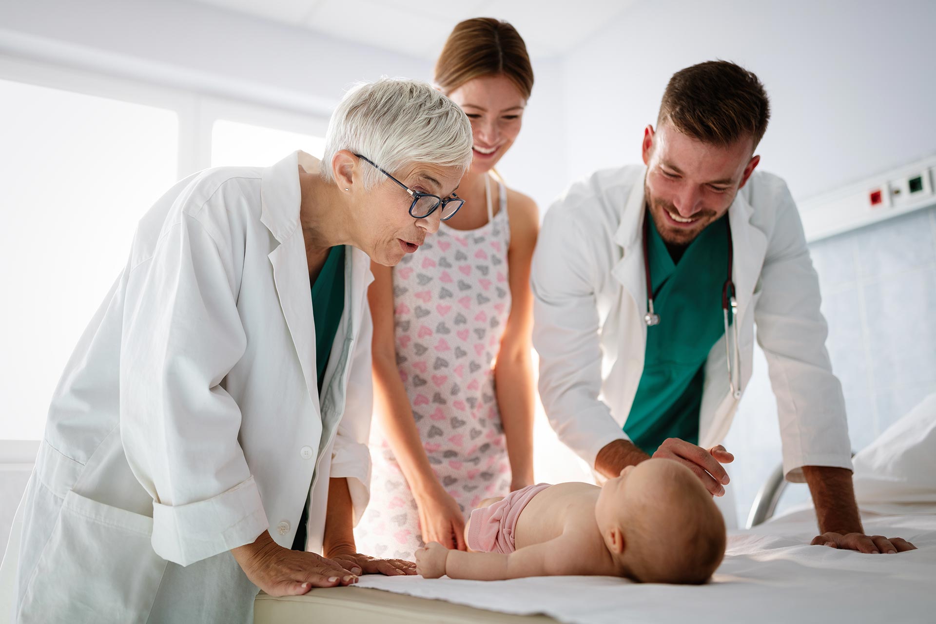 happy-beautiful-mother-and-little-baby-on-medical-2022-02-02-03-57-17-utc.jpg